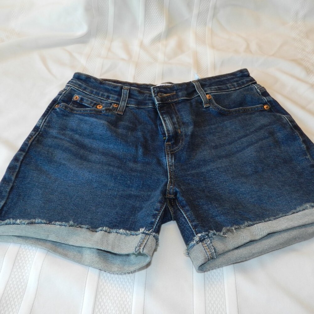 Levi's Denizen dark wash mid-rise 5-pocket style cutoff hem denim shorts